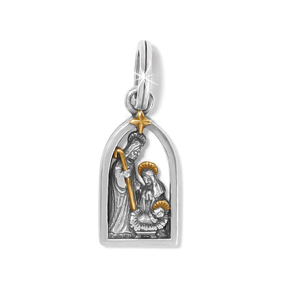 Brighton nativity charm with silver-tone arched frame, gold star, and holy family figures on a white background