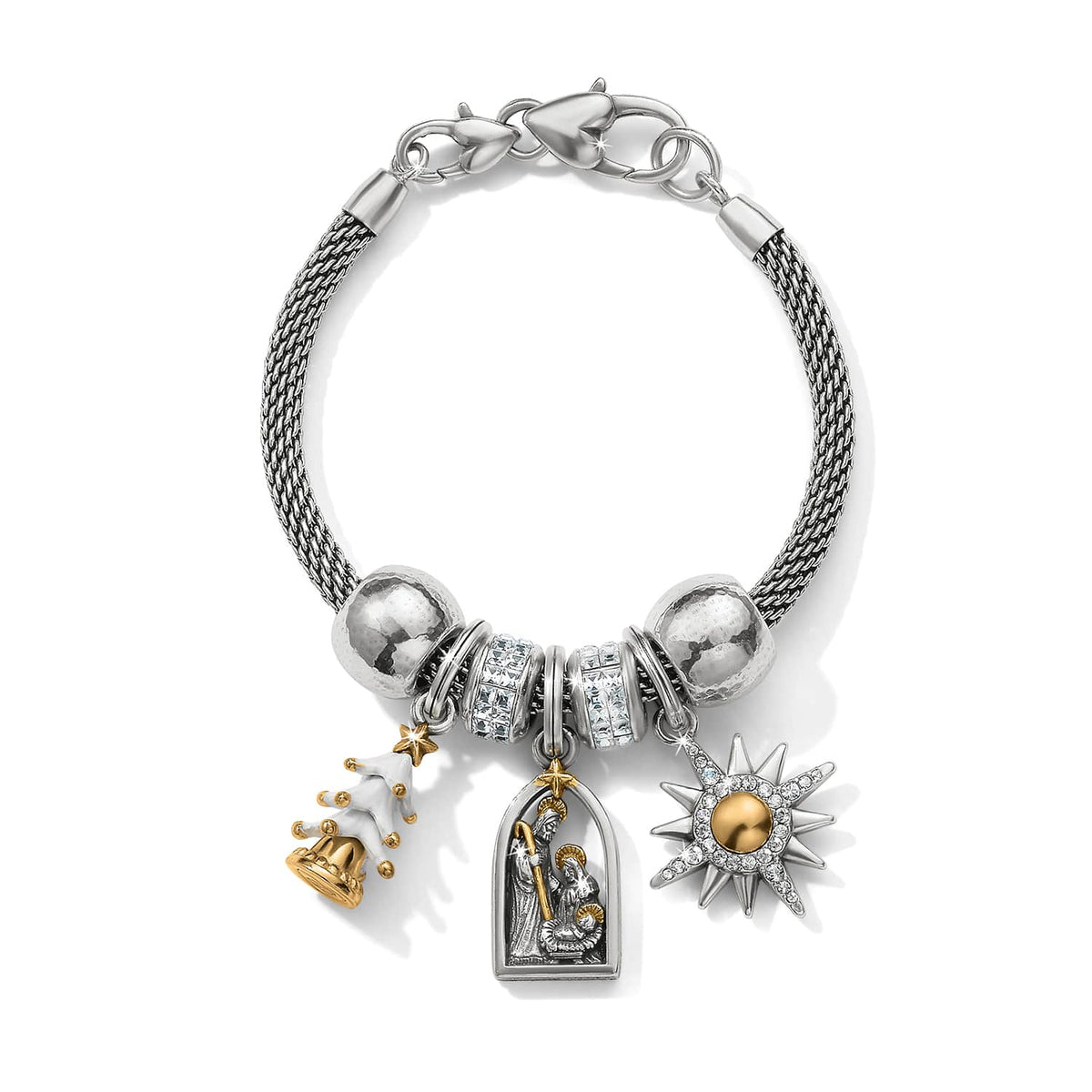 Brighton charm bracelet with silver mesh chain, nativity, Christmas tree, and starburst charms on a white background