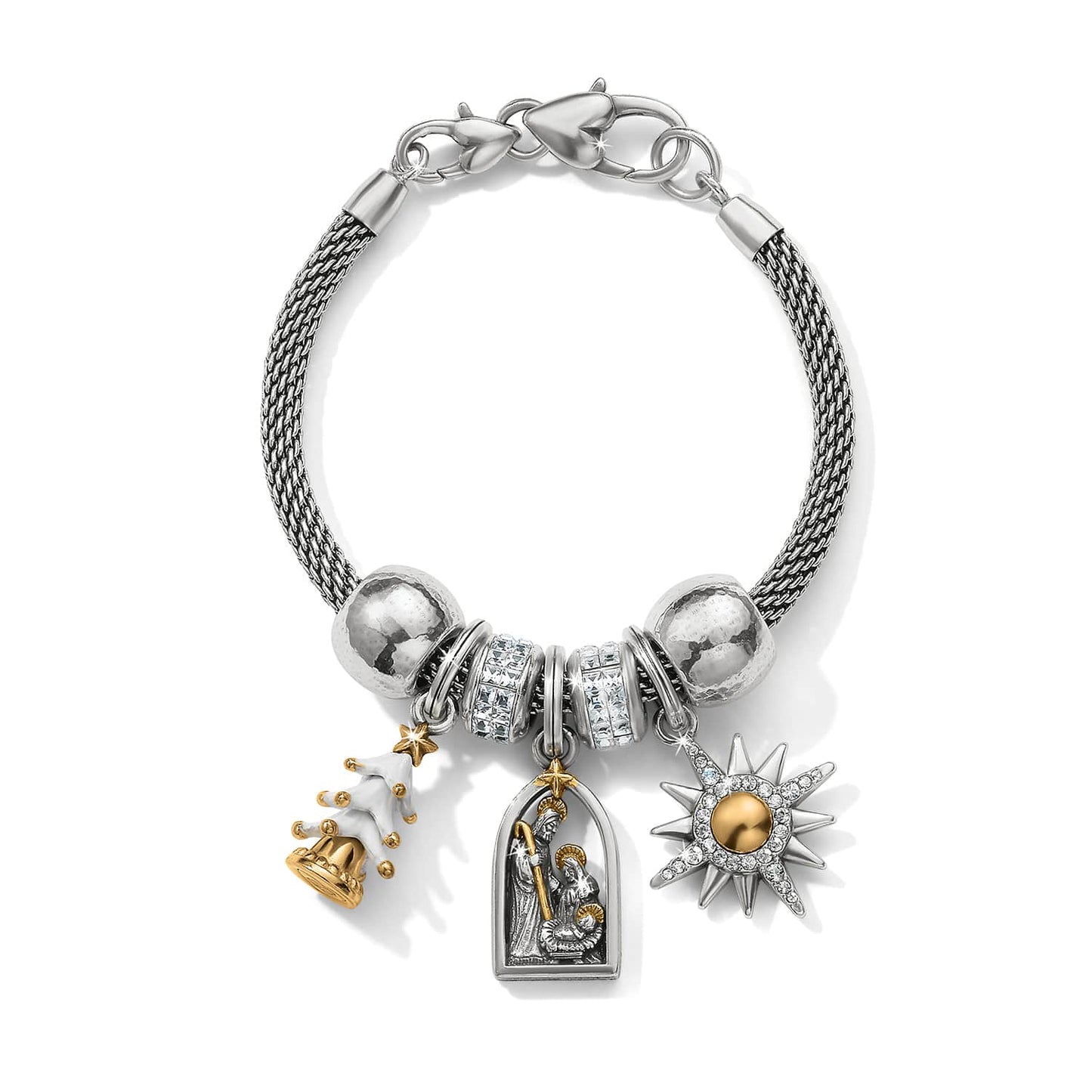 Brighton charm bracelet with silver mesh chain, nativity, Christmas tree, and starburst charms on a white background