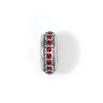 Brighton charm bead with silver-plated finish and red crystal accents around the band on a white background