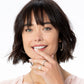 Model wearing Brighton silver-plated hoop earrings with coordinating Brighton rings and delicate chain necklace