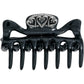 Brighton black hair claw clip with silver-plated ornate heart and scroll medallion accent on a white background