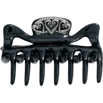 Brighton black hair claw clip with silver-plated ornate heart and scroll medallion accent on a white background