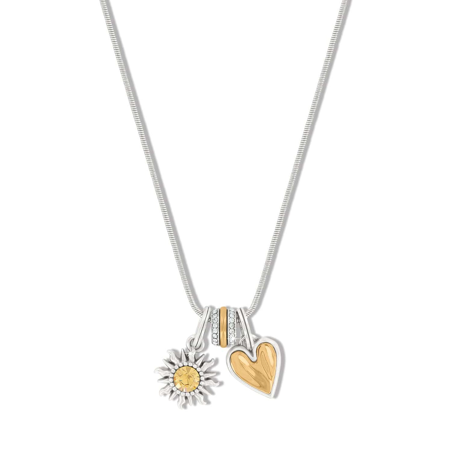 Brighton charm necklace with silver-plated sun, gold-tone heart, and crystal accent bail on a white background