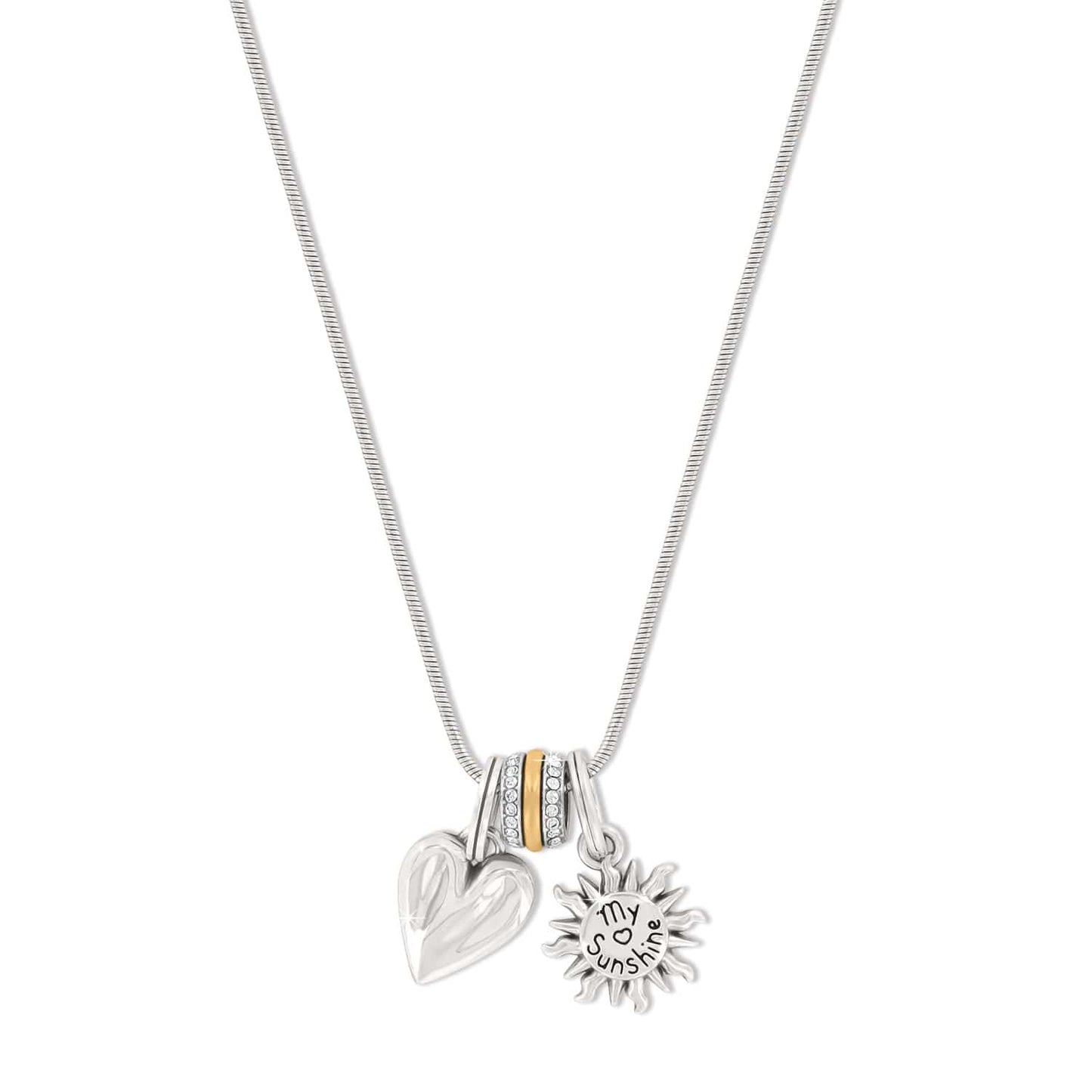 Brighton pendant necklace with silver-plated heart, crystal ring, and sunshine charm on a white background