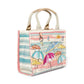Brighton canvas tote handbag with embroidered beach umbrellas, pastel stripe print, and canvas handles on a white background