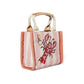 Brighton handbag with pink striped canvas, embroidered red lobster, canvas handles, and leather trim on a white background