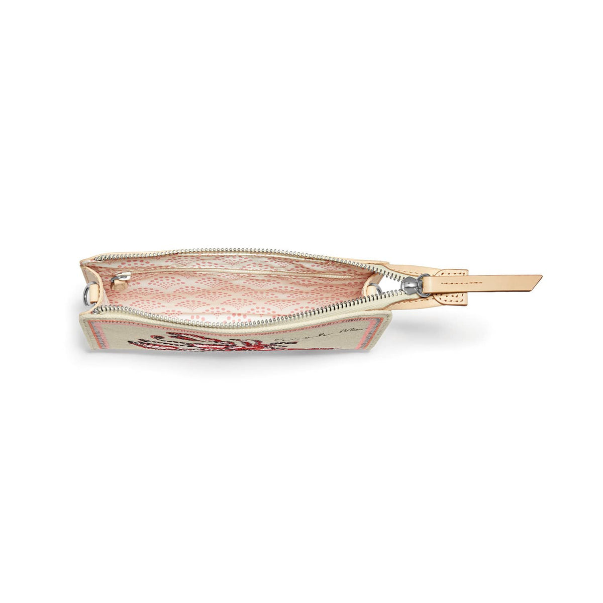 Brighton pouch shown open with pink patterned interior lining, silver-tone zipper, and leather wristlet strap on a white background