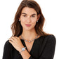 Model wearing a Brighton silver-plated cable necklace with crystal stations and coordinating Brighton accessories