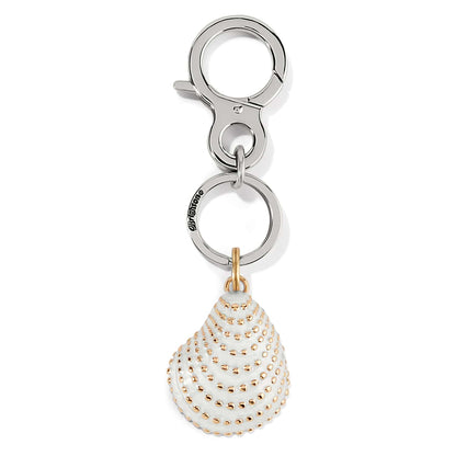 Brighton keychain with white enamel seashell charm featuring gold-plated dot accents and silver-tone clasp on white background