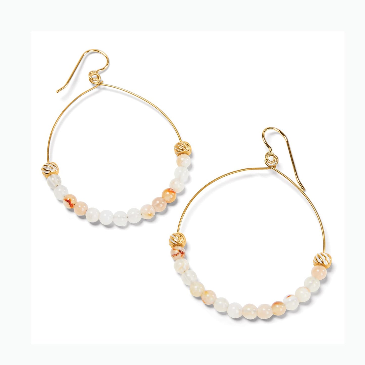 Brighton hoop earrings with gold-plated wire, cream and peach beads, and decorative gold accents on a white background