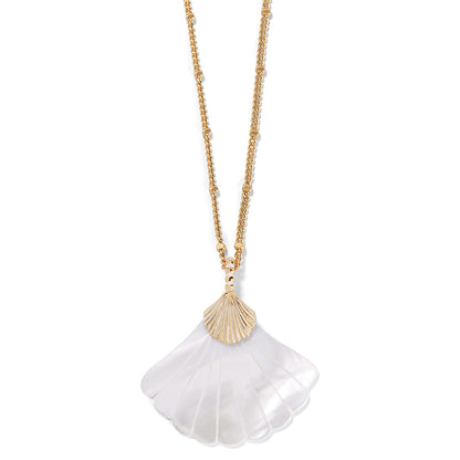 Brighton pendant necklace with white shell charm and gold-plated scallop accent on beaded chain on a white background