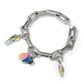 Brighton charm bracelet with silver-tone link chain, enamel flip-flop, beach ball, and surfboard charms on a white background