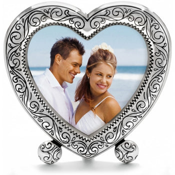 Brighton heart-shaped photo frame with silver-plated scroll engraving and decorative ball feet on a white background