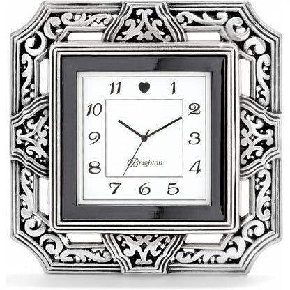 Brighton square clock with silver-plated ornate scrollwork frame and black border around numbered face on a white background