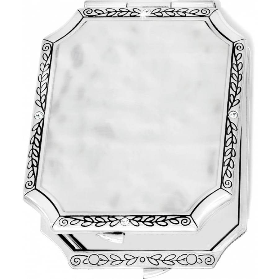 Brighton silver-tone compact mirror with engraved leaf border, crystal accents, and hammered center panel on a white background