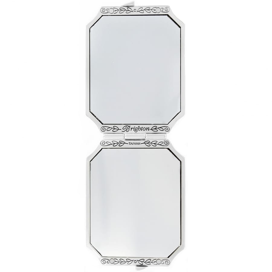 Brighton compact mirror shown open with silver-tone scrollwork frame and engraved logo detail on a white background