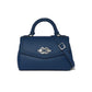 Brighton top-handle handbag in blue pebbled leather with braided handle, silver-tone knot clasp, and adjustable strap on a white background