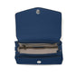 Brighton blue leather handbag shown open with patterned fabric interior, zip pocket, and silver-tone snap closure on a white background
