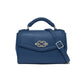 Brighton blue leather handbag with braided top handle, silver-tone knot clasp, and adjustable crossbody strap on a white background