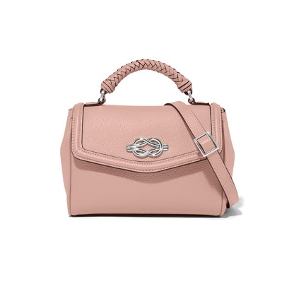 Brighton handbag in pink with silver-tone knot clasp, braided top handle, and adjustable crossbody strap on a white background