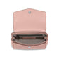 Brighton pink pebbled handbag shown open with patterned interior lining, zip pocket, and silver-tone snap closure on a white background