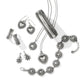 Brighton silver-plated jewelry collection styled with heart earrings, bangle, starburst bracelet, and pendant necklaces on white background