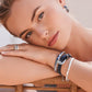 Terra Hoop Earrings worn by a model, showcasing the size and elegant style