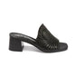 Brighton black leather heeled mule sandal with perforated swirl design and medallion accent on a white background