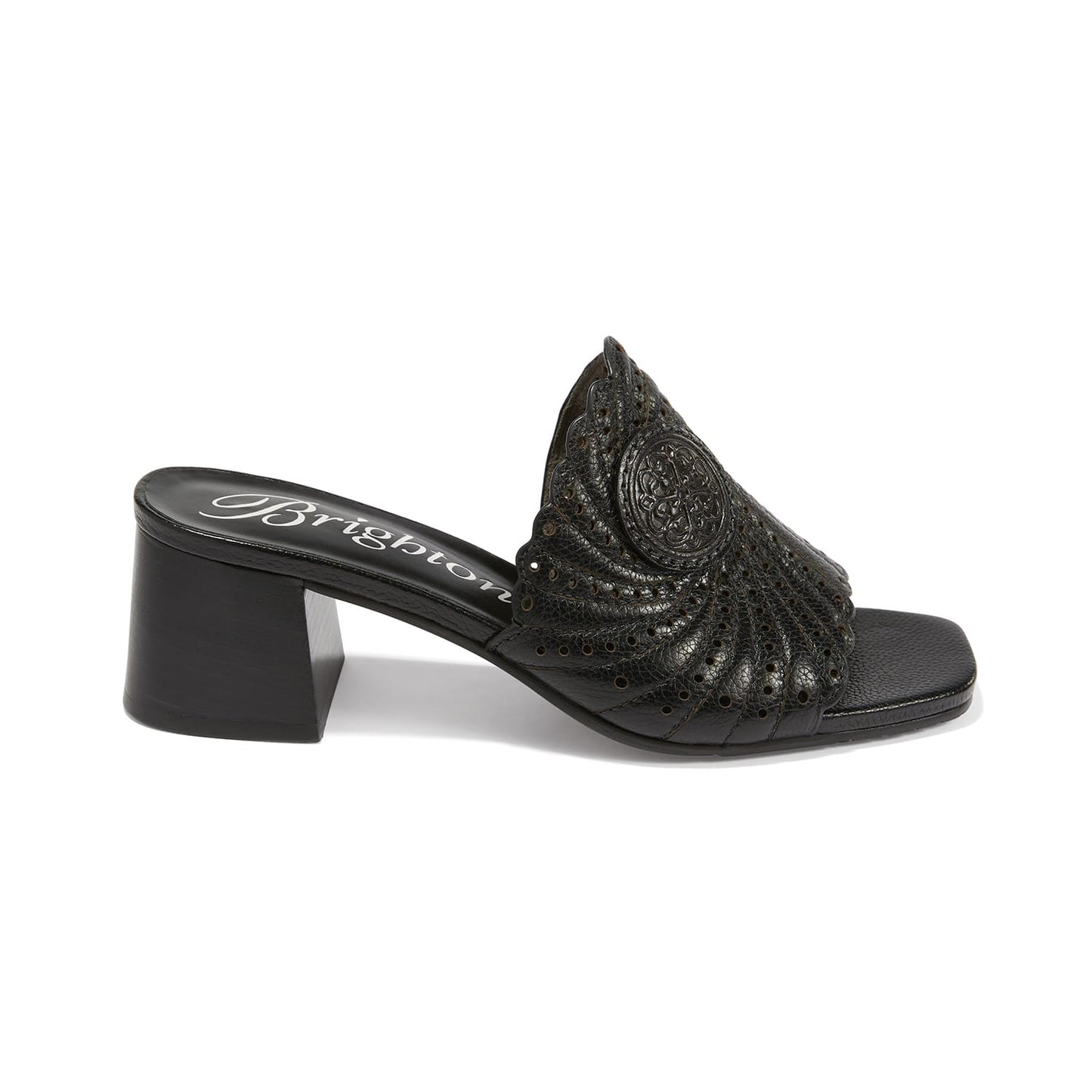 Brighton black leather heeled mule sandal with perforated swirl design and medallion accent on a white background