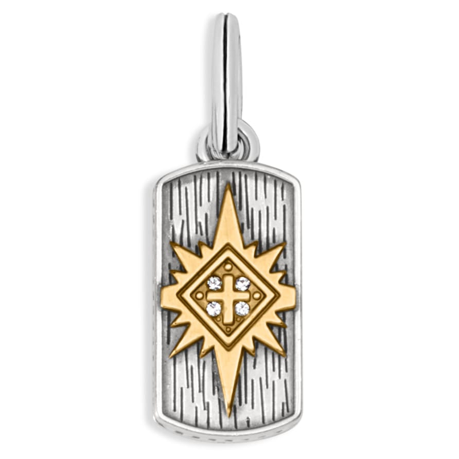Brighton pendant charm with gold-tone starburst, cross motif, and crystal accents on silver-plated tag on a white background