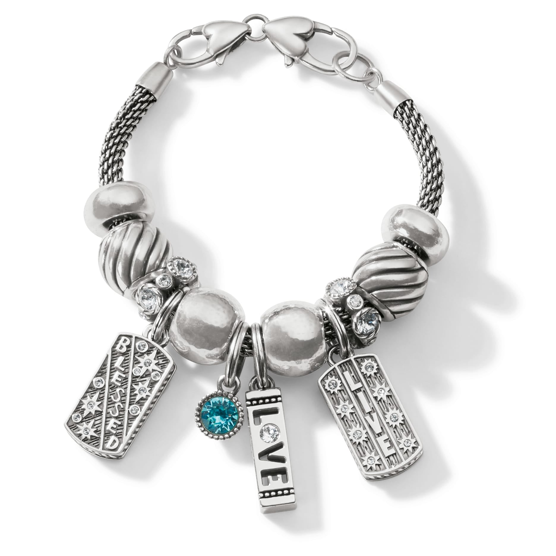 Brighton charm bracelet with silver-plated beads, crystal accents, blue stone, and Blessed, Love, Live charms on a white background