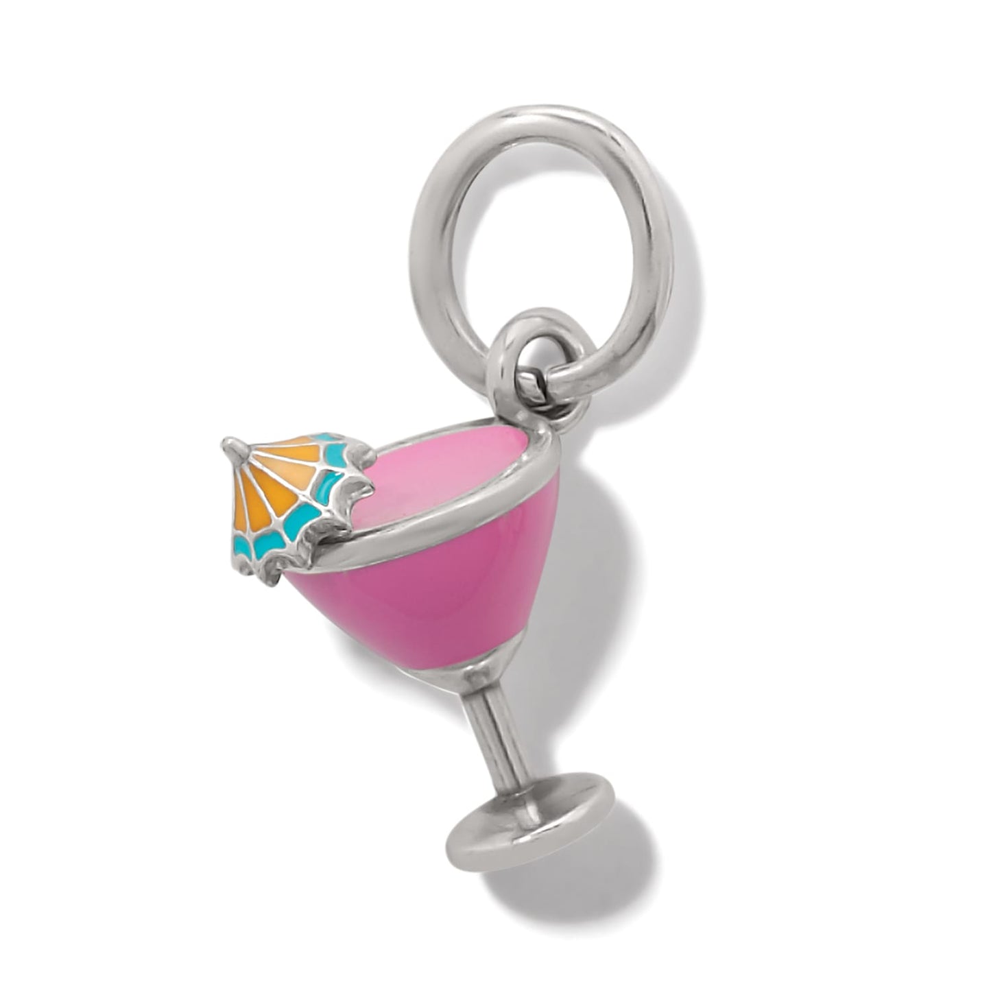 Brighton charm shaped like a pink enamel cocktail glass with orange and teal umbrella on a white background