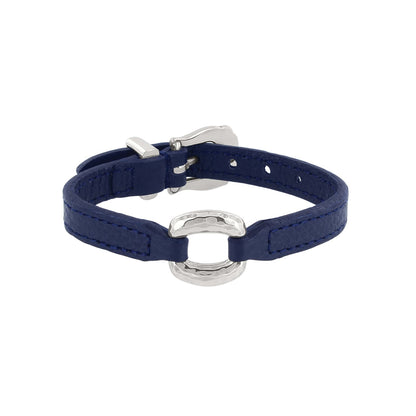 Brighton bracelet with blue leather strap, hammered silver-plated oval centerpiece, and buckle closure on a white background