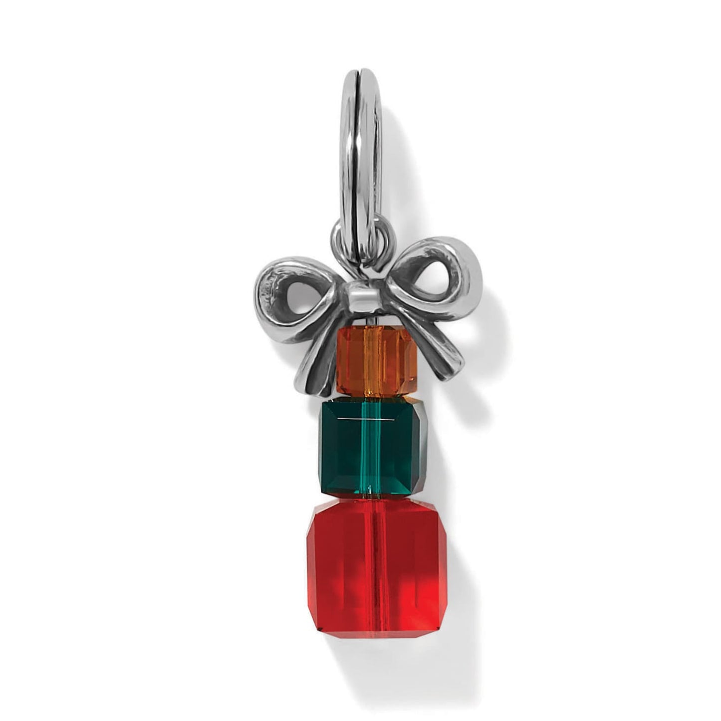 Brighton charm shaped like a stacked gift with amber, green, and red crystals and silver-plated bow on a white background