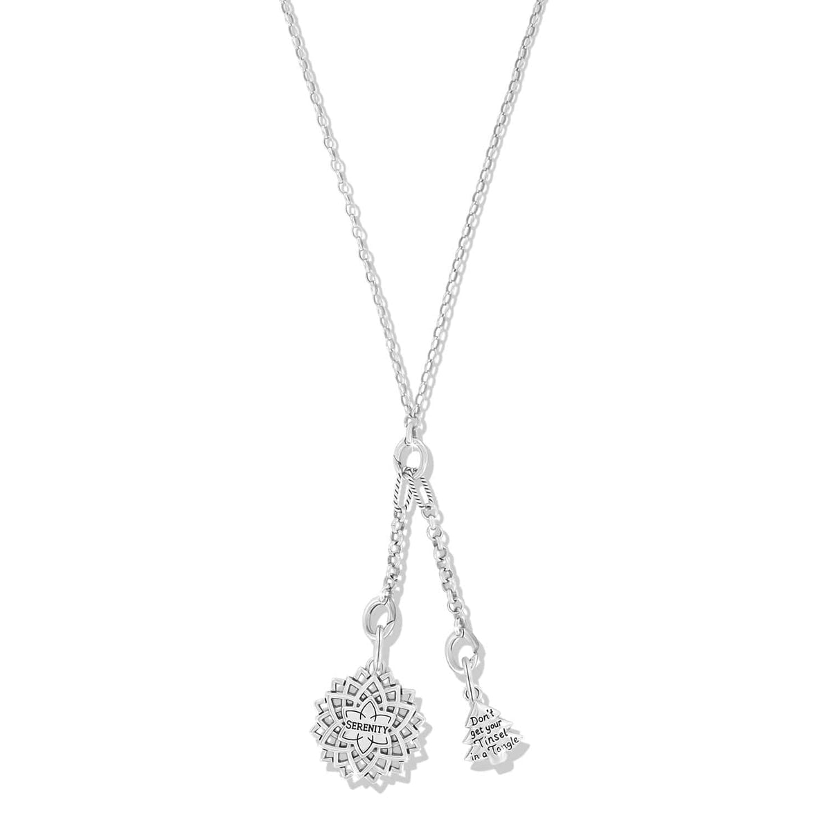 Brighton charm necklace with silver-tone Serenity mandala charm and tree charm with engraved text on a white background