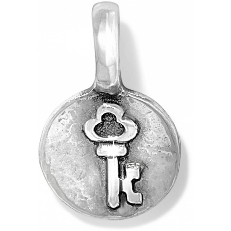 Brighton charm with silver-plated round medallion featuring embossed skeleton key design and top loop on a white background
