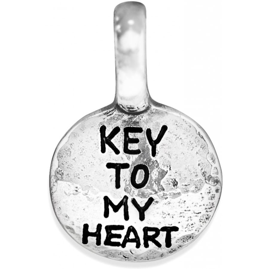 Brighton round charm with silver-plated finish and engraved Key To My Heart text on a white background