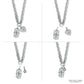 Brighton silver-plated chain necklace shown with interchangeable cross tag, heart, and crystal charms on a white background