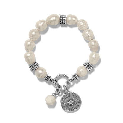 Brighton beaded bracelet with freshwater pearls, silver-plated accents, and round medallion charm on a white background