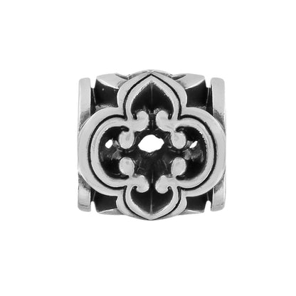 Brighton silver-plated charm with openwork quatrefoil scroll design and ornate detailing on a white background