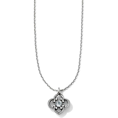 Brighton pendant necklace with silver-plated quatrefoil design and center crystal on a white background