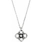 Brighton pendant necklace with silver-plated openwork quatrefoil design and centered crystal accent on a white background