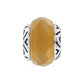 Brighton charm bead with faceted amber stone center and silver-plated chevron patterned sides on a white background