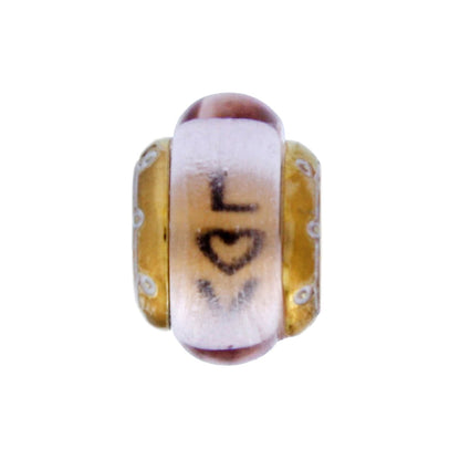Brighton charm bead with pink glass center, brushed gold accents, and engraved love heart motif on a white background