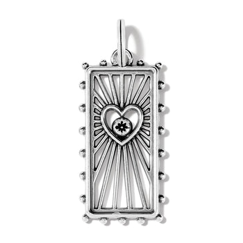 Brighton silver-plated rectangular charm pendant with radiating rays, heart motif, crystal accent, and beaded edges on a white background