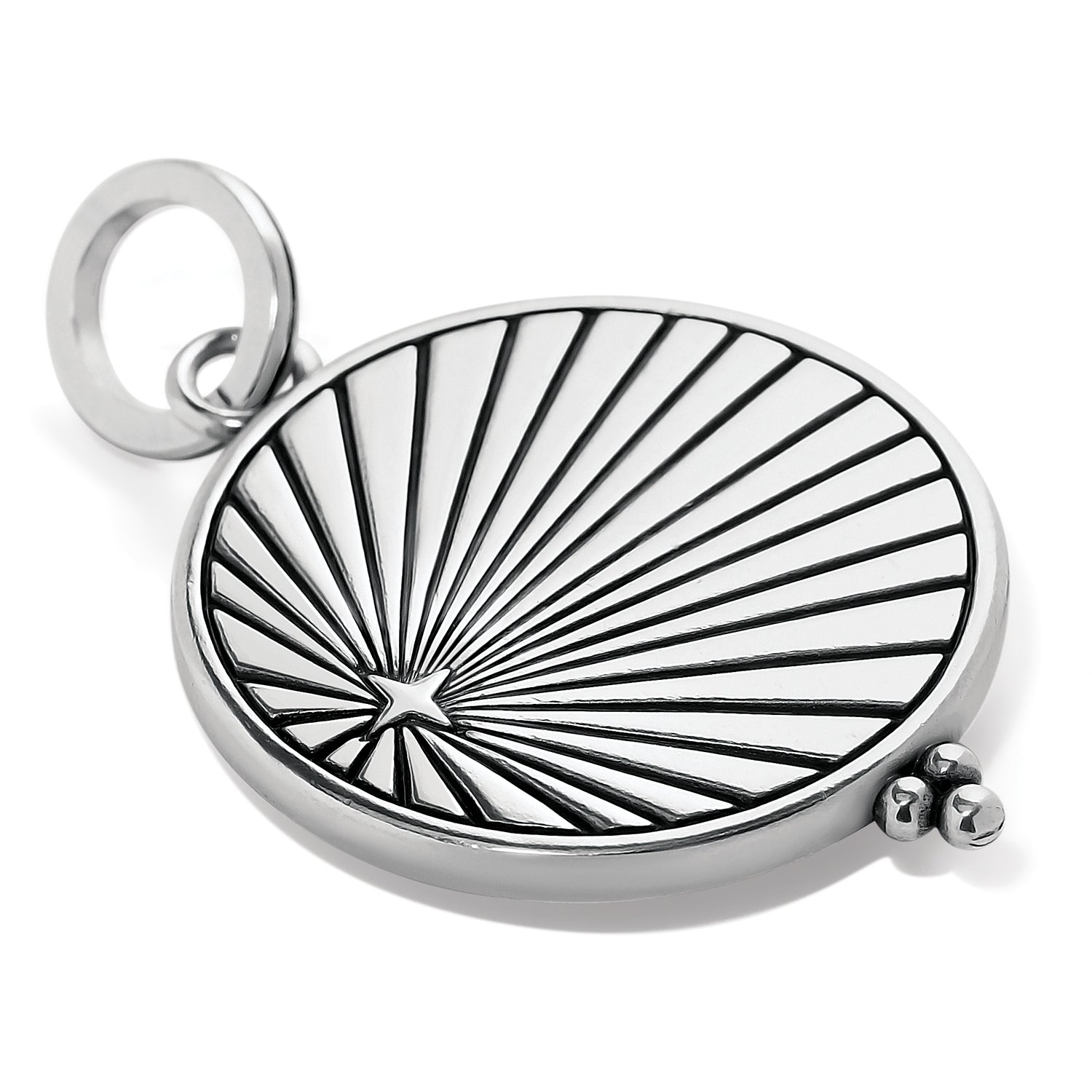 Brighton silver-plated round charm with engraved sunburst design, star accent, and beaded detail on a white background