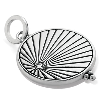 Brighton silver-plated round charm with engraved sunburst design, star accent, and beaded detail on a white background
