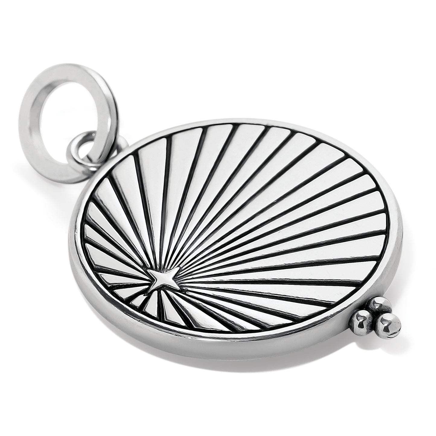 Brighton silver-plated round charm with engraved sunburst design, star accent, and beaded detail on a white background