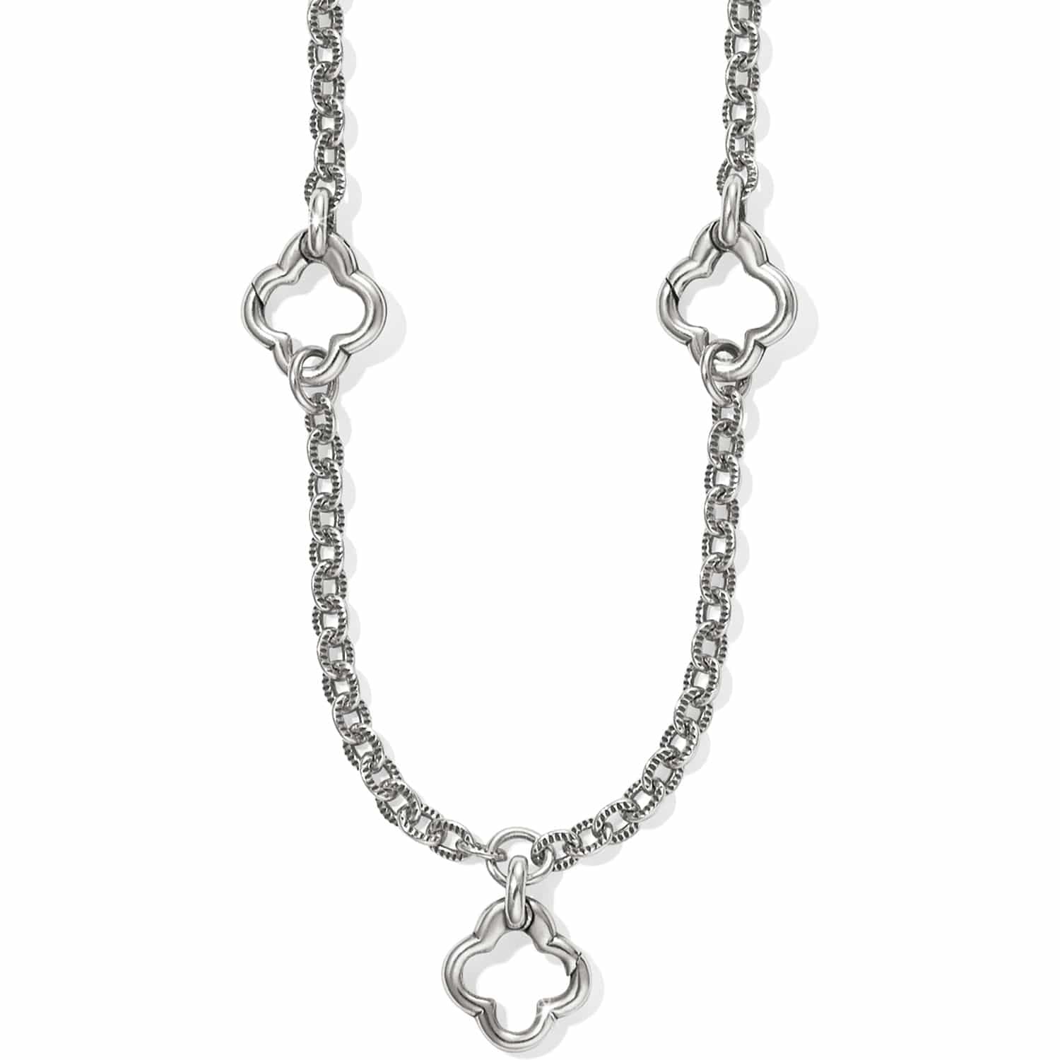 Brighton necklace with silver-plated textured chain and three open quatrefoil clover link stations on a white background